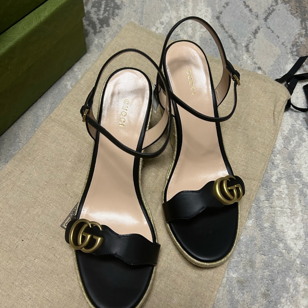 Gucci Black Sandals with Gold Detailing